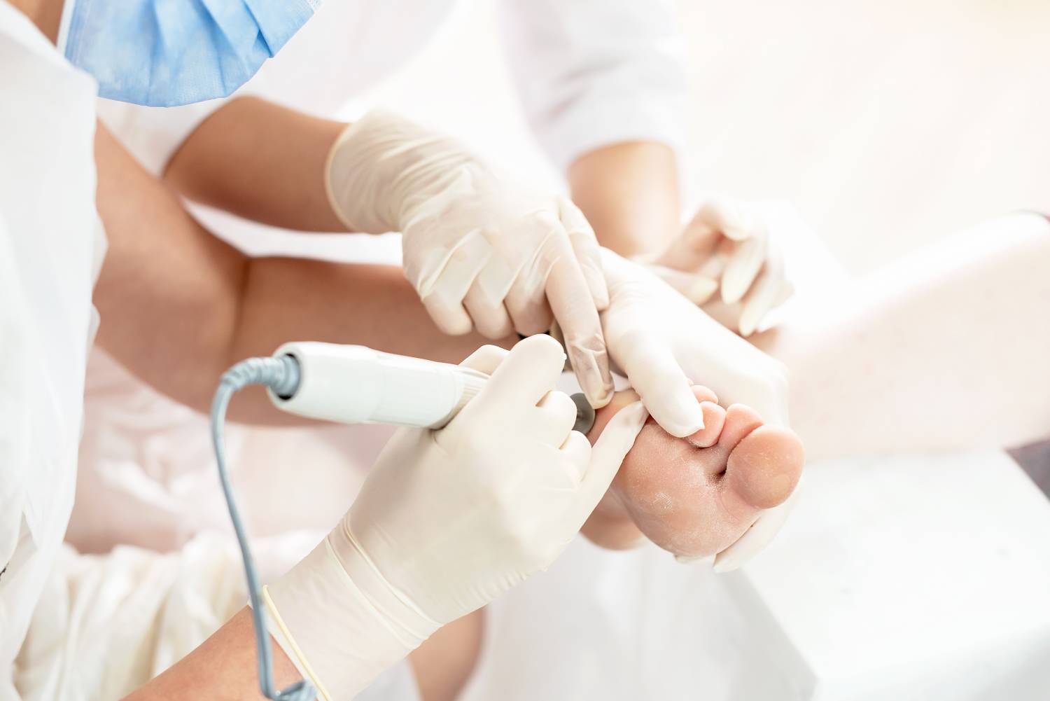 Beauty course training - leaning pedicure step by step. Training for pro nail technician, beauty expert. Practitioner training in pedicure, beauty salon. Nail Technician Instructor with her student.