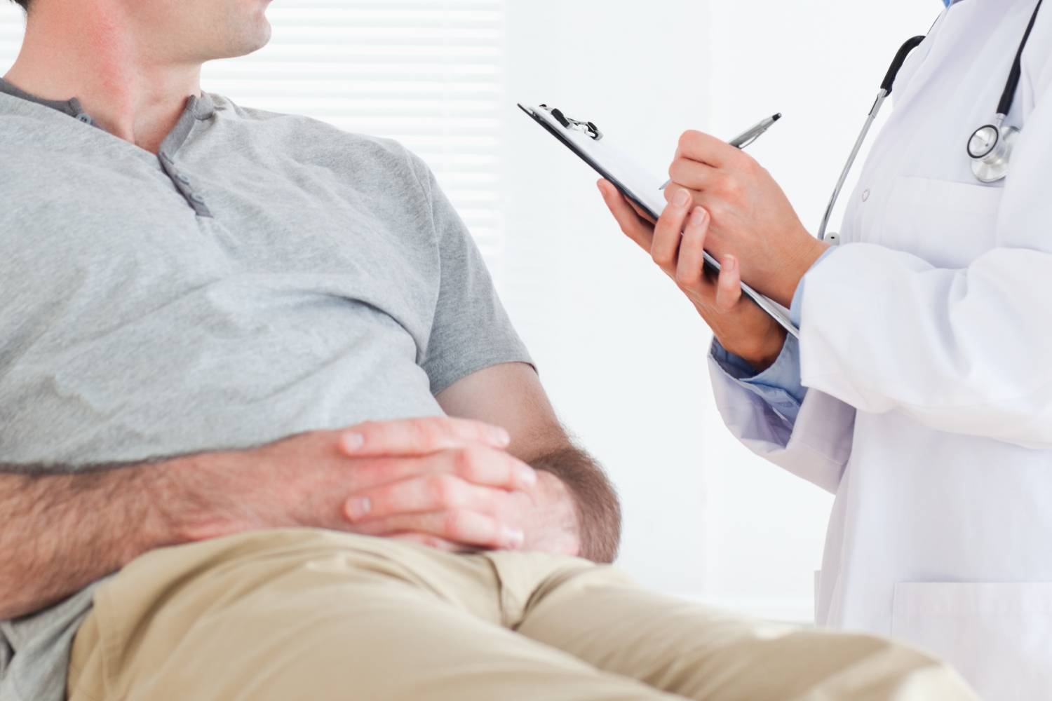 Female doctor talking to a patient