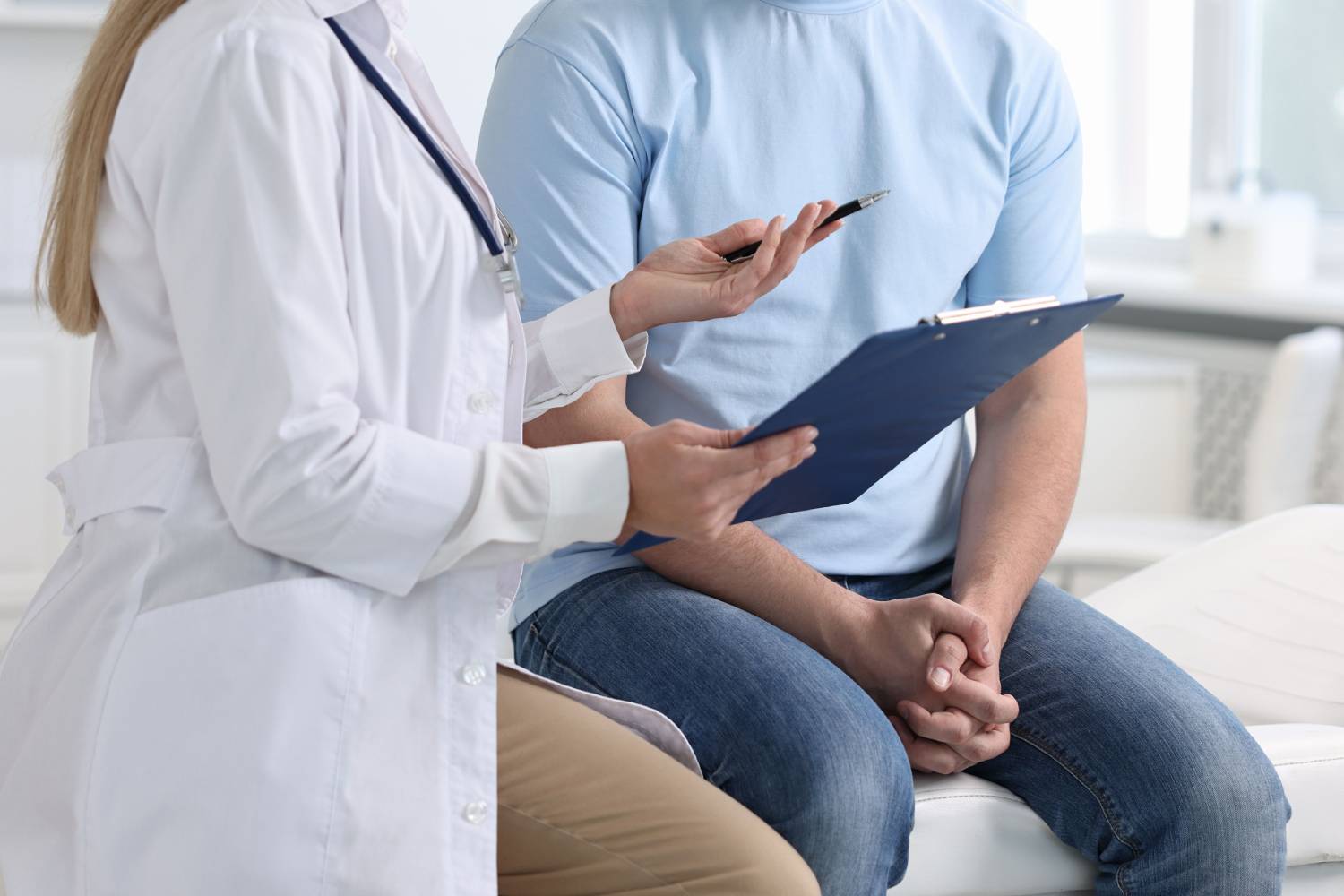 Professional doctor working with patient in hospital